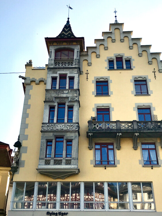 ochre+beige+swiss+architecture+german+influence+blogger+design+yellow+building